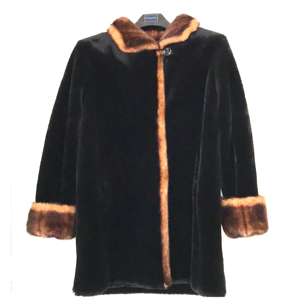 Two toned faux fur coat. Never worn.